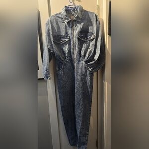 vintage 80s acid wash long-sleeved denim jumpsuit with a zipper front closure